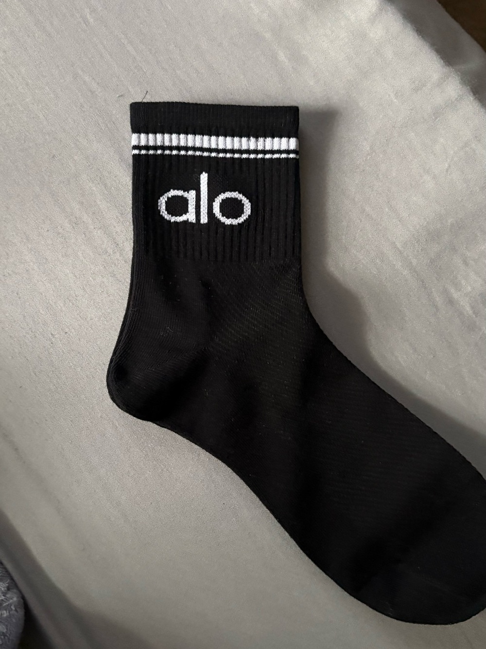ALO Yoga Black Crew Sock with White Logo and Stripes
